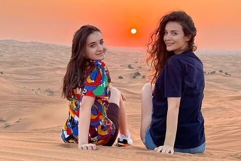 Røde sanddyner Sunset Desert Safari med mulighet for firehjuling og kameltur