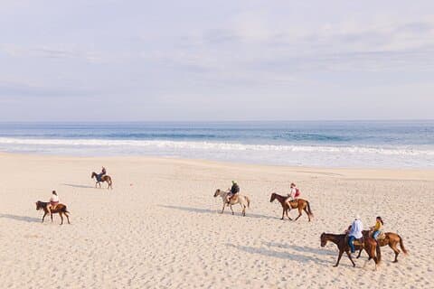 Ridetur på stranden i Puerto Escondido