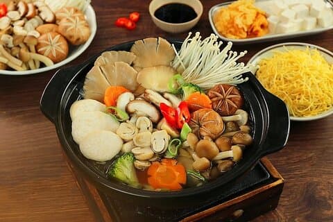 Tour gastronómico vegetariano de Ho Chi Minh en moto