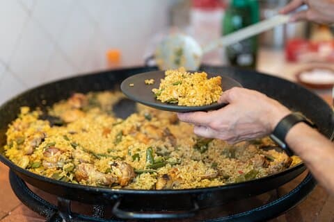 Enjoy your Paella with Purchase to Russafa Market in Valencia