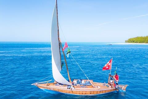 Exclusive private full-day Dhow sail & snorkel Mnemba sandbank