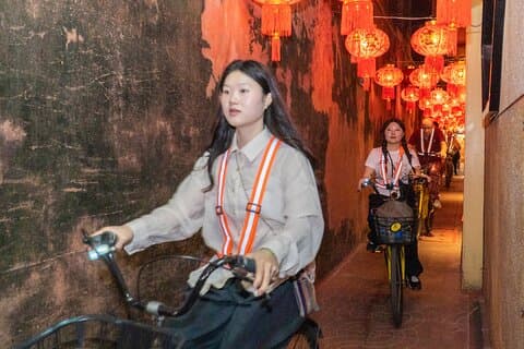 Visite à vélo nocturne du quartier chinois et du marché aux fleurs à Bangkok