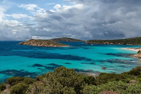 Cagliari to Tuerredda Beach Shared Tour by Minivan