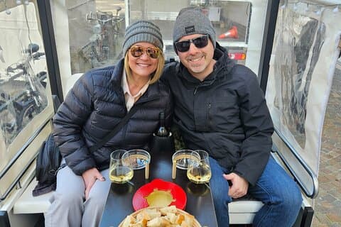 Fondue and wine private Tuk Tuk tour in Geneva