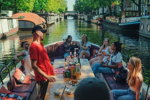 Amsterdam canal cruise in open boat – Guided tour