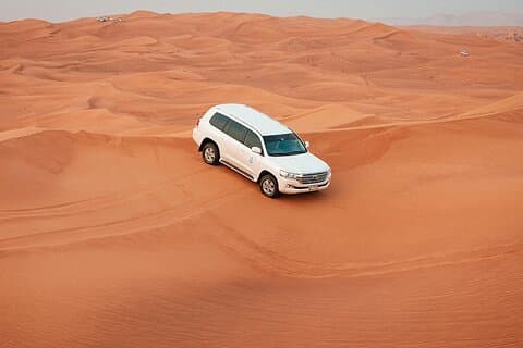 Desert Safari Tour Dubai Camel Ride and Buggy and Quad Biking
