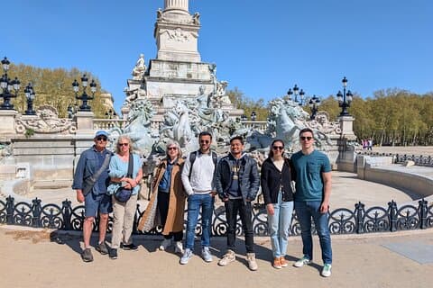 Bordeaux Scenic Walking Tour Experience with a glass of wine.