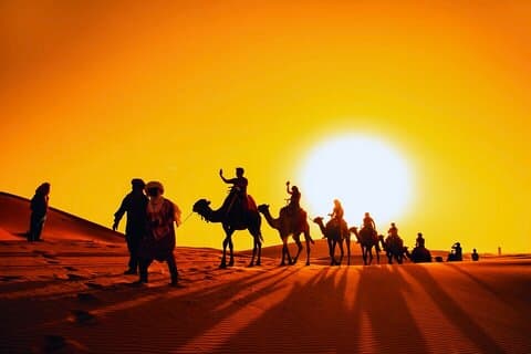 Sunset Evening Desert Safari with Dune Bashing Camel Ride & BBQ