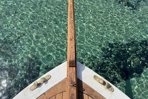 Private Cruise: Explore Rina’s Cave & Enjoy Fresh Seafood Onboard