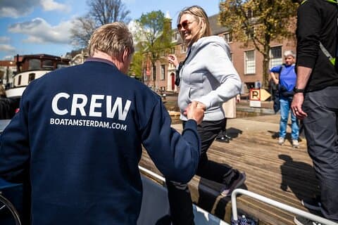 Amsterdam Open Boat Cruise with Live Guide and Two Drinks