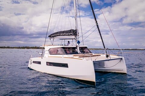 Private 34' Aventura Catamaran – Tulum with Snacks & Open Bar