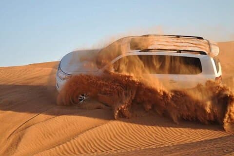 Dubai Desert Safari Dune Bashing, Camel Ride, and BBQ Dinner