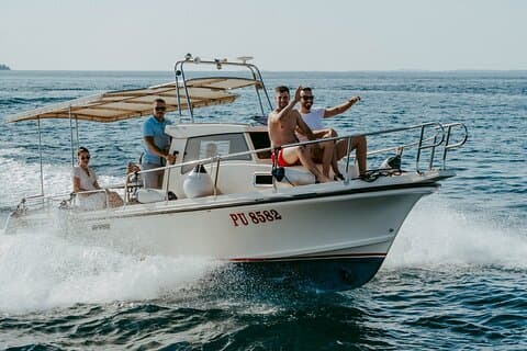 Swim, Snorkel and Explore Istrian Coast by Private Boat from Pula