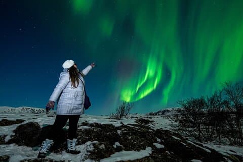 Tour privado en aurora boreal con fotos, trajes de nieve y aperitivos