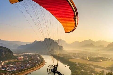 Vang vieng: Kayaking,Paragliding,hotel pick-up