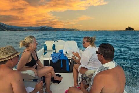 Sunset boat cruise with wine and food tasting from Garda