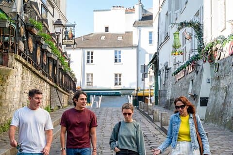 Paris in a Day: Louvre Entry + Guided Montmartre & City Walks