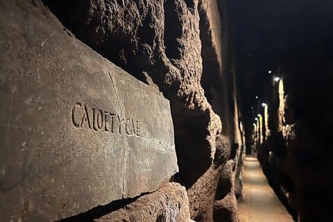 Catacombe per piccoli gruppi di St.Callixtus Experience in carrello golf