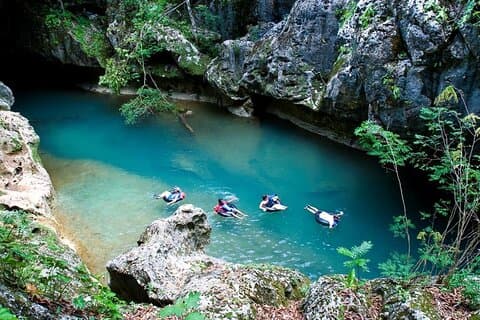 Jaguar Paw Cave Tubing & Zipline Adventure from Hopkins Village