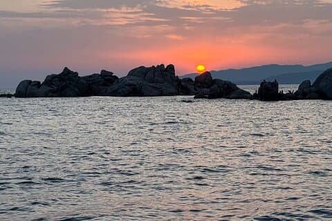 Sunset, swim with fish, Corsican aperitif