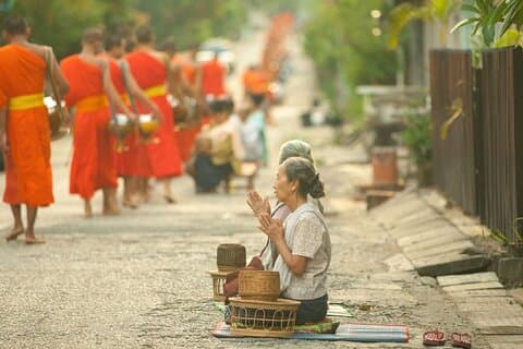 Luang Prabang Alms Giving and Kuang Si Waterfall Private Tour