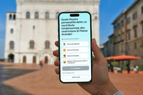 Tour interactivo autoguiado a pie por Gubbio con concursos
