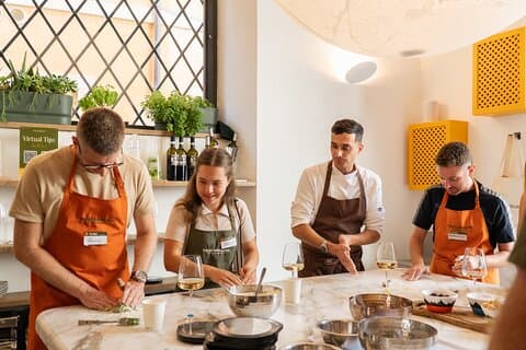 Cook & Dine in Rome: Pizza, Ravioli & Gelato with Unlimited Wine