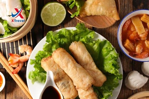 Experiencia vietnamita de la clase de cocina del rollo de primavera