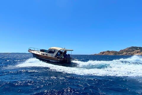 Tour della Corsica del Sud in motoscafo di legno con pranzo da Palau