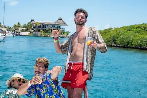 Drinks & Comfortable Beach Club at Isla Mujeres! Catamaran Tour
