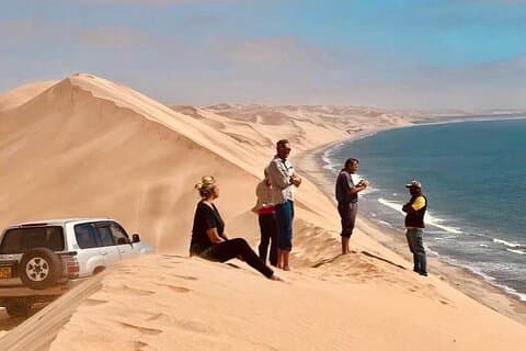 Doha: Inland Sea Desert Safari with Camel Ride & Dune Bashing