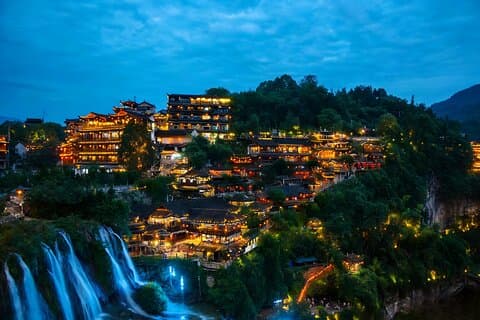 Zhangjiajie’s Night Escape: Furong Old Town's Glow&Boat Adventure