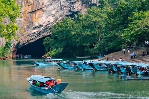Phong Nha en Paradise Cave Volledige dag Boot en Trekking Avontuur