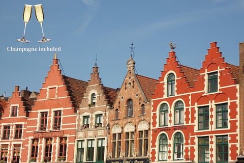 Bruges Private Tour from Paris with Champagne and Canal Cruise