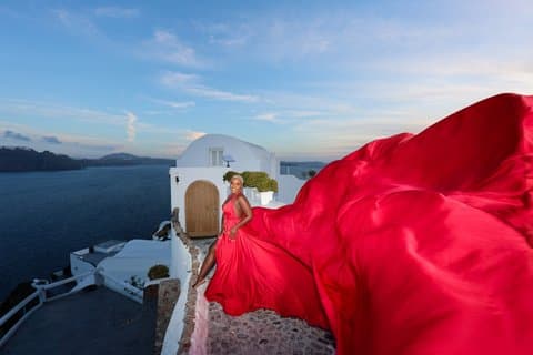 Flying Dress Photoshoot in Santorini, Blue Domes and Caldera View