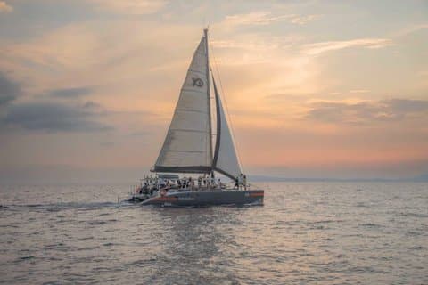 Crociera in catamarano al tramonto di Maiorca con DJ e cena mediterranea
