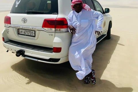 Qatar Desert Adventure Dune Bashing Camel Ride en Falcon foto
