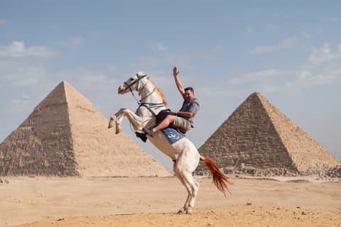 Giza pyramids jumping horse photoshoot