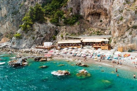 Amalfi Lido degli Artisti Beach Club Sonnenliege Sonnenschirm Prosecco