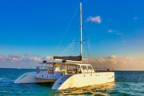 Catamaran Cruise to Isla Mujeres with Snorkeling and Lunch