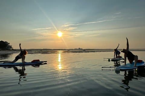 Sunset Paddleboard Yoga Class in Seabrook