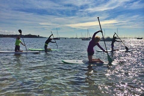 Rise and Shine Paddleboard Yoga Class a Hingham MA