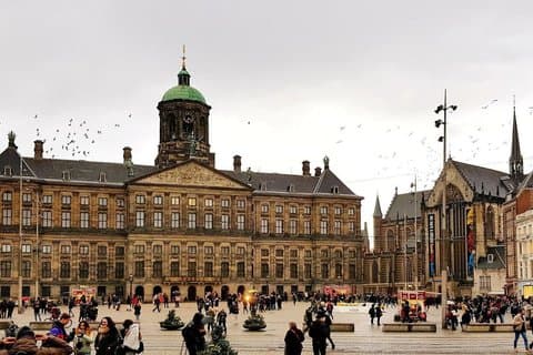 Tour audio del biglietto del Palazzo Reale e passeggiata della città ad Amsterdam