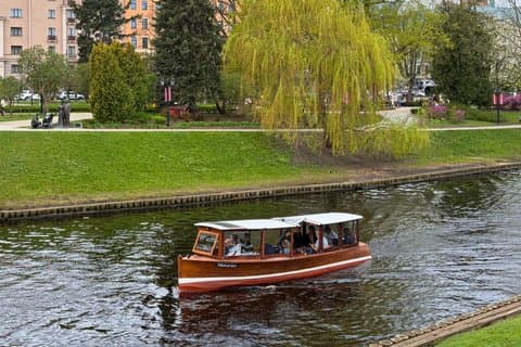 Riga Canal and Daugava Boat Tour with Welcome Drink & Audio Guide