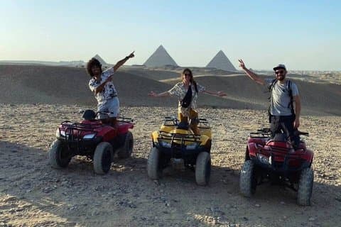 Giza pyramids and quad ATV bike around Sahara desert in Giza