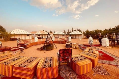 Merzouga Desert Overnight: Camel Trekking, Sandboarding & Berber