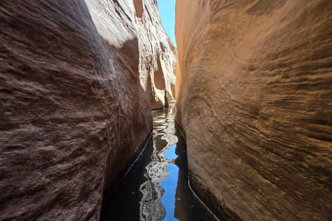Remote Water-Filled Slot Canyon Adventure