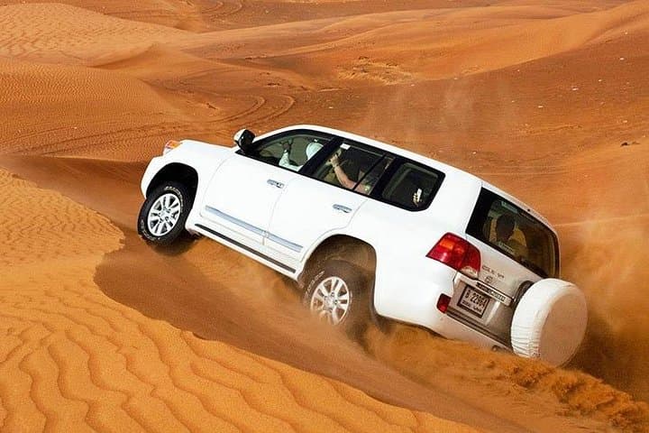 Morning Desert Safari Abu Dhabi with Camel Ride and Sandboarding