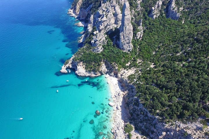 One day guided boat tour along the Baunei coast.