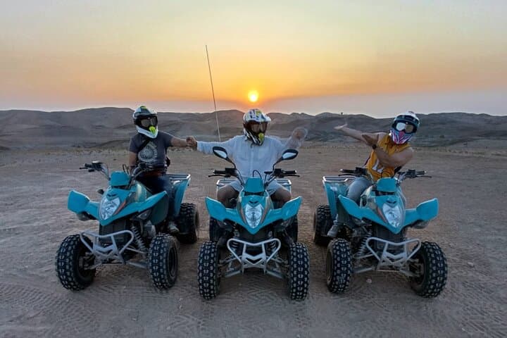 Quad biking in Agafay desert at sunset